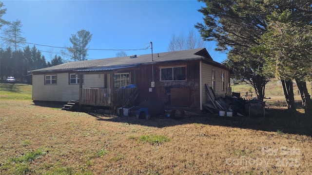 exterior space featuring a front lawn