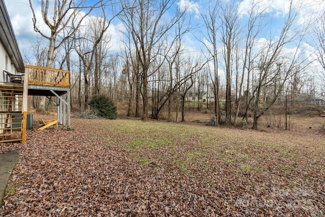 view of yard with a deck