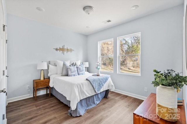 bedroom featuring hardwood / wood-style flooring