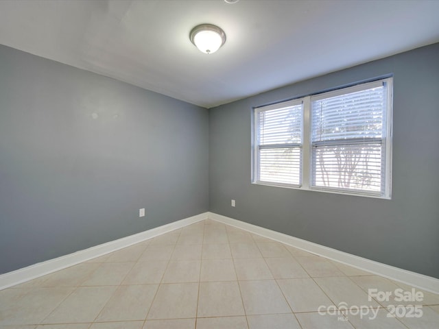 view of tiled spare room