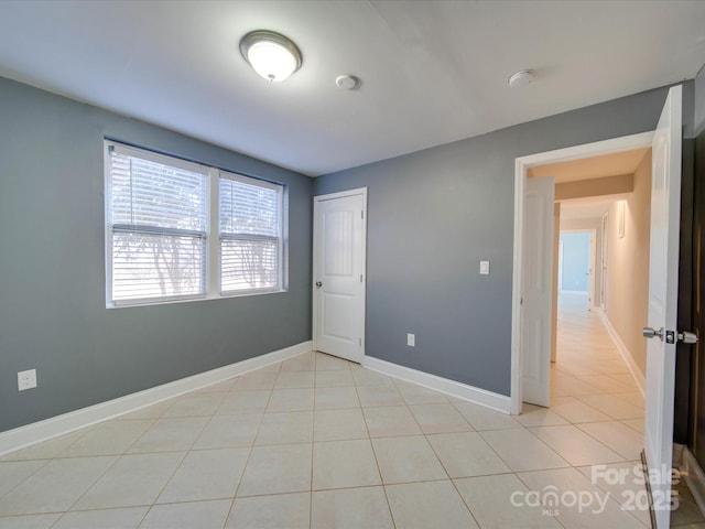 view of tiled spare room