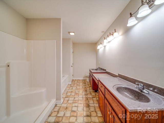 full bathroom with vanity, shower with separate bathtub, and toilet