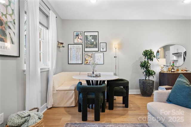 dining room featuring light hardwood / wood-style flooring