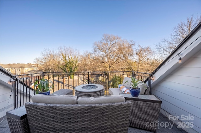 deck featuring an outdoor fire pit