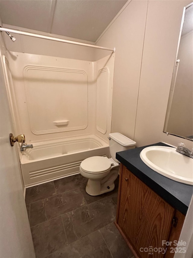 full bathroom featuring vanity, tub / shower combination, and toilet