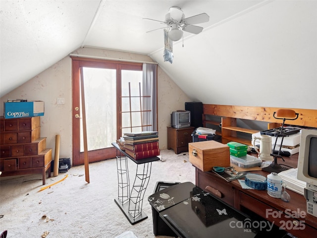 additional living space featuring ceiling fan and vaulted ceiling