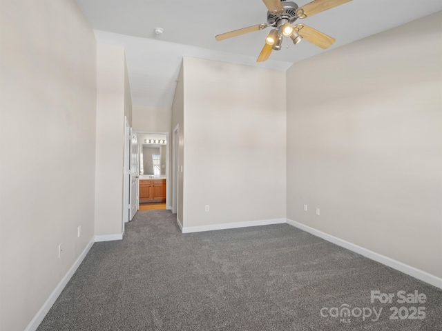 carpeted empty room with ceiling fan