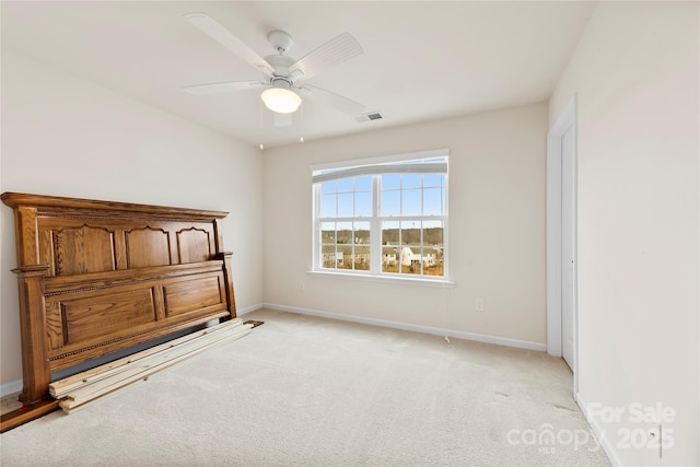 1605 Appledale Ct Unit 116, Fort Mill, SC 29715 - unfurnished bedroom with light carpet, baseboards, and a ceiling fan