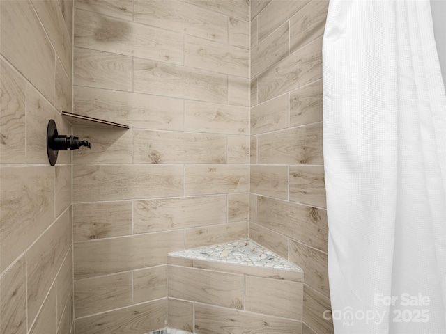 bathroom with a shower with curtain