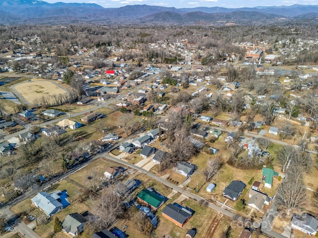 drone / aerial view featuring a mountain view