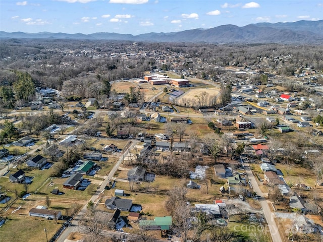 birds eye view of property featuring a mountain view