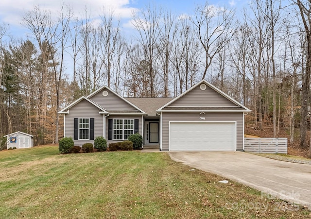 single story home featuring a garage and a front yard