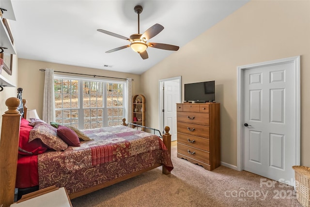 bedroom featuring vaulted ceiling, carpet flooring, and ceiling fan