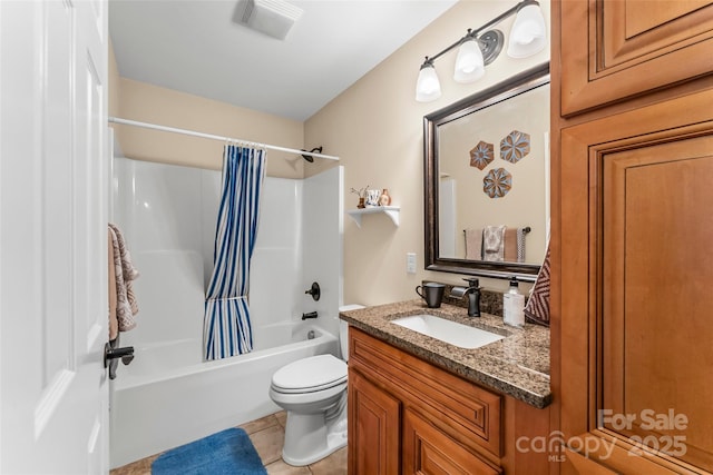 full bathroom featuring vanity, shower / bathtub combination with curtain, tile patterned floors, and toilet