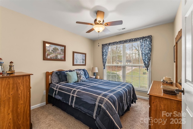 bedroom with light colored carpet and ceiling fan