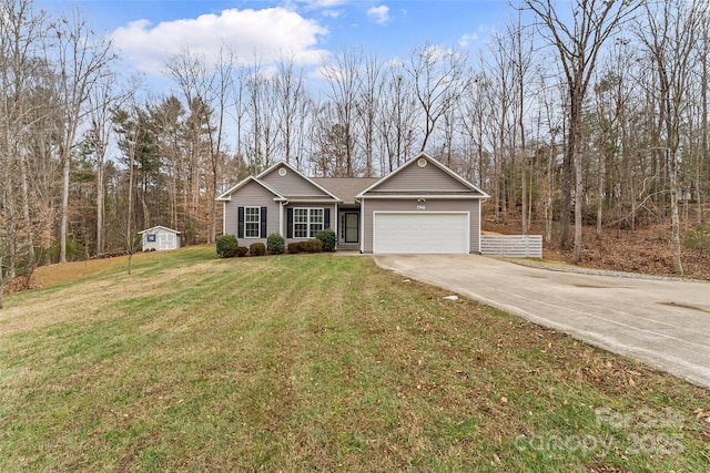 view of front of property with a garage and a front lawn