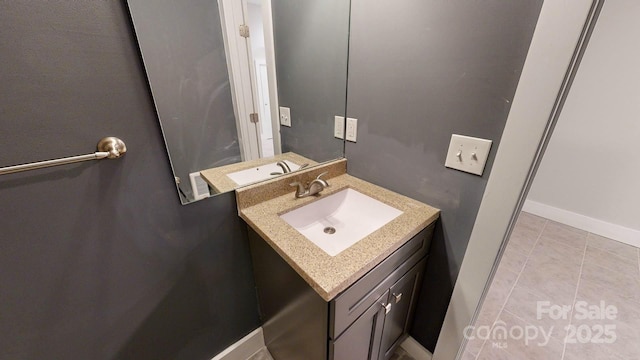 bathroom with vanity and tile patterned flooring