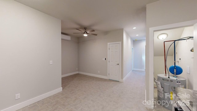 interior space featuring water heater, a wall mounted AC, and ceiling fan