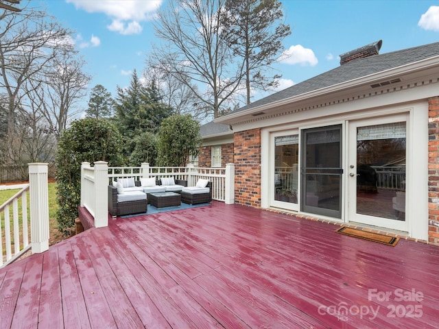 wooden deck featuring outdoor lounge area