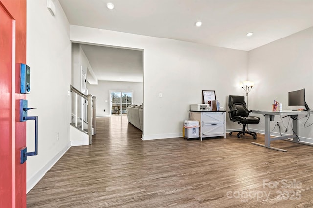 office with dark hardwood / wood-style floors