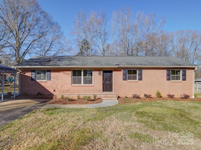 single story home featuring a front yard