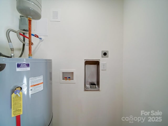 utility room with water heater