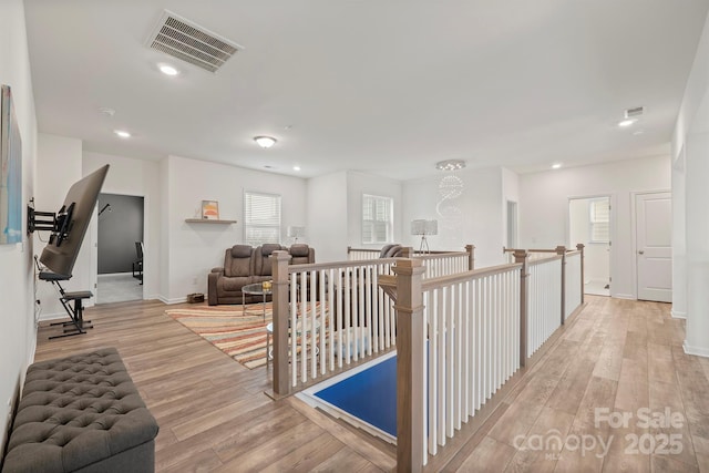 hall featuring light hardwood / wood-style flooring