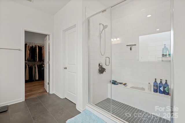 bathroom featuring an enclosed shower