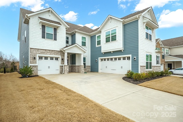 view of front of house with a garage and a front lawn