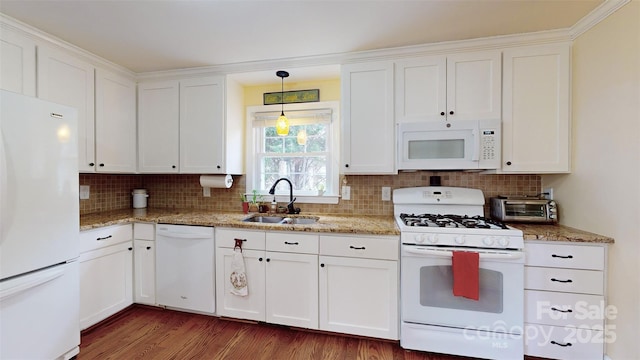 kitchen with decorative light fixtures, white cabinetry, sink, dark wood-type flooring, and white appliances