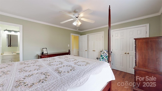 bedroom featuring ensuite bath, ornamental molding, dark hardwood / wood-style floors, and ceiling fan