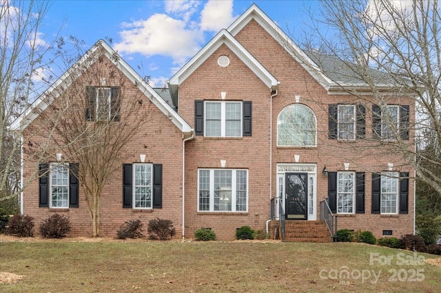 view of front of house with a front lawn