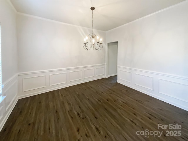 unfurnished dining area with dark hardwood / wood-style flooring and a notable chandelier