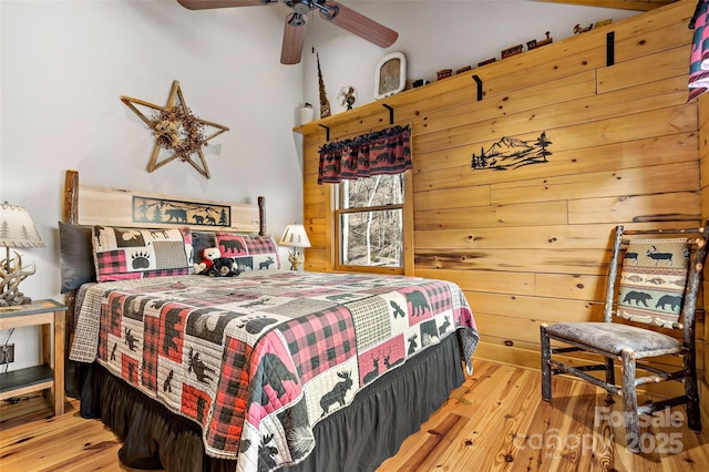 bedroom featuring a ceiling fan and wood finished floors