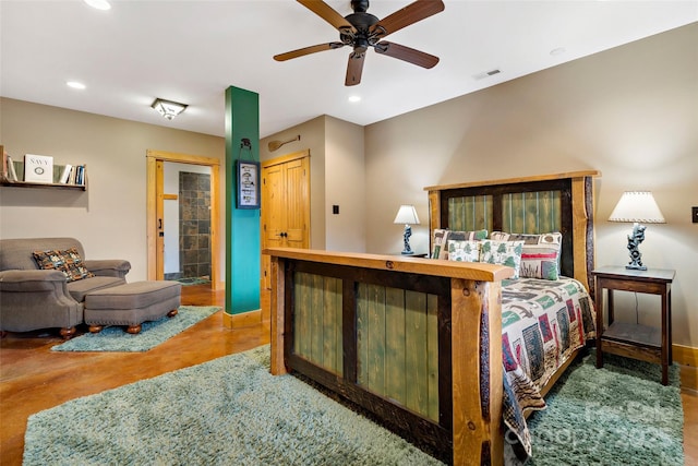 bedroom featuring visible vents, baseboards, finished concrete floors, and recessed lighting