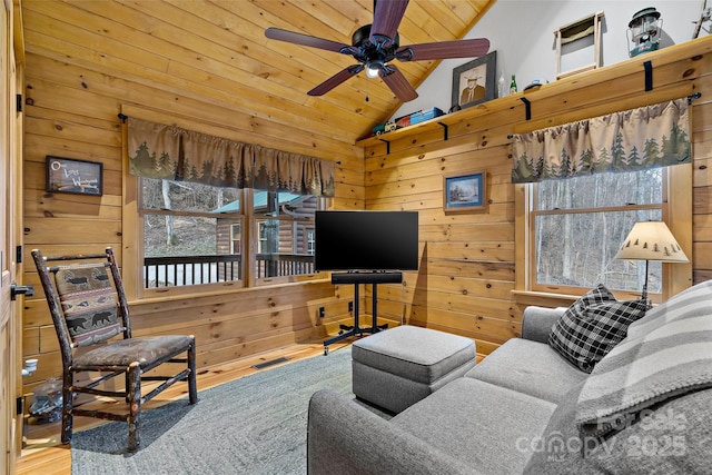 108 Oak Winds Dr Unit 202S, Old Fort, NC 28762 - living area with vaulted ceiling, wood finished floors, wood ceiling, a ceiling fan, and wood walls