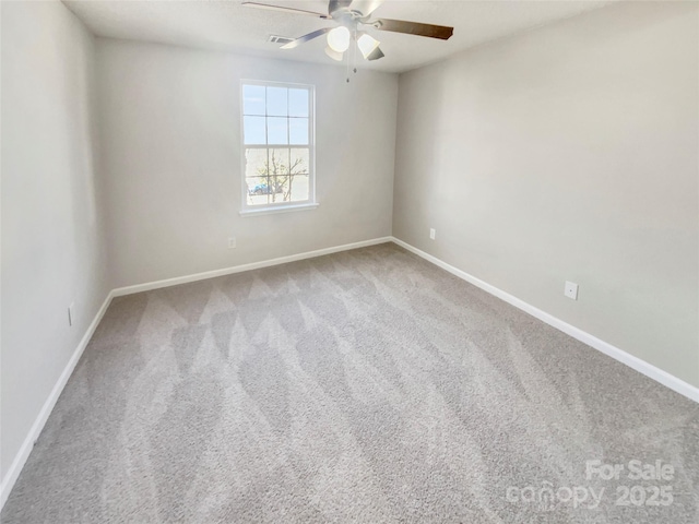 unfurnished room with carpet floors and ceiling fan