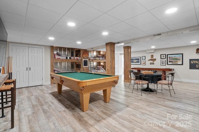 recreation room with light hardwood / wood-style flooring, billiards, and a paneled ceiling