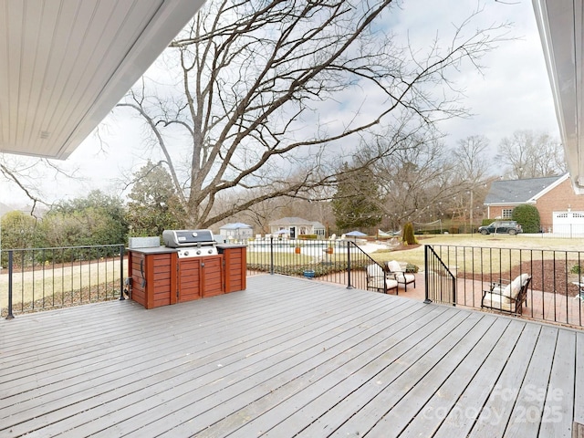 deck featuring grilling area