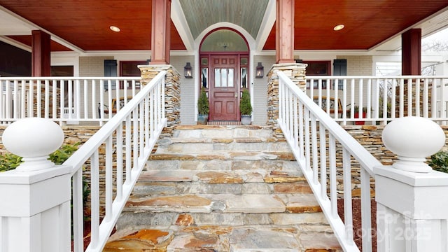 doorway to property with a porch