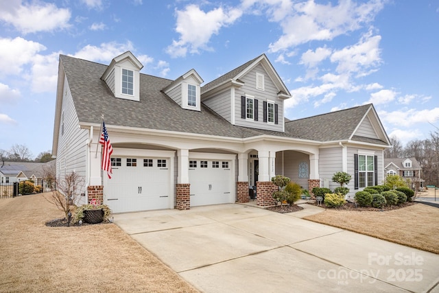 view of front of property with a garage