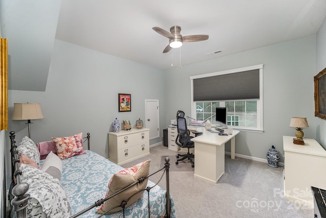 bedroom featuring light carpet and ceiling fan