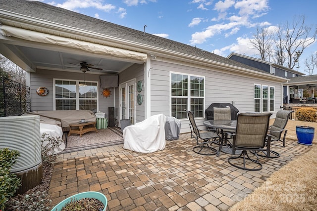 view of patio featuring ceiling fan