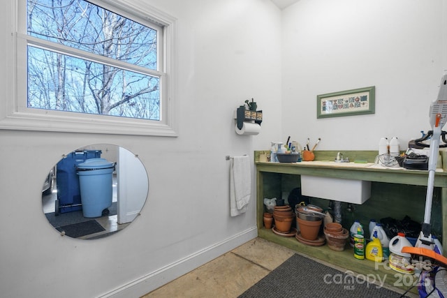 bathroom with tile patterned floors