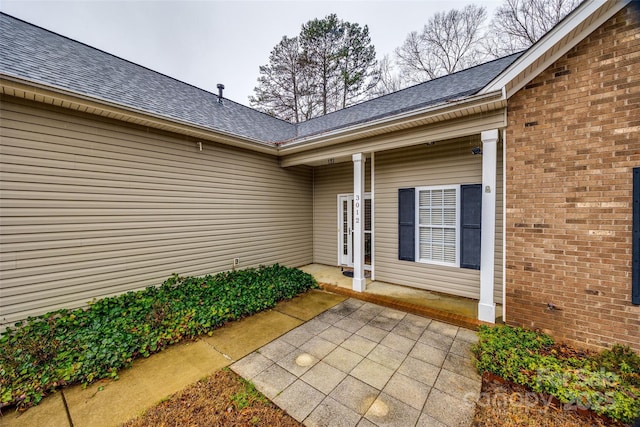 doorway to property featuring a patio area