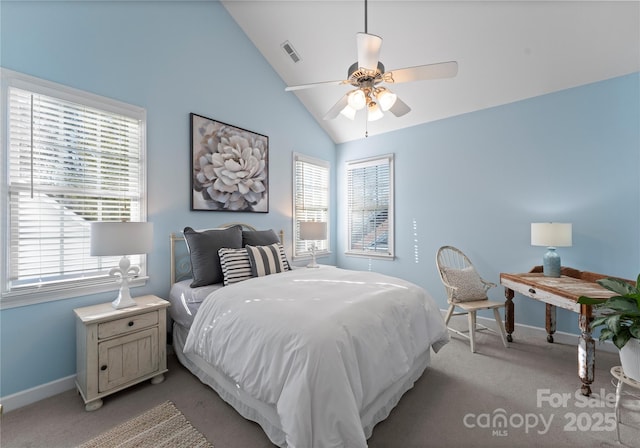 bedroom with visible vents, vaulted ceiling, light carpet, and baseboards