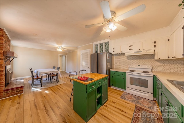 kitchen featuring white cabinets, light wood-type flooring, green cabinetry, and white range with electric cooktop