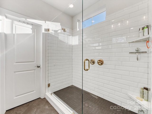 bathroom featuring an enclosed shower