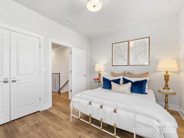 bedroom featuring light hardwood / wood-style flooring