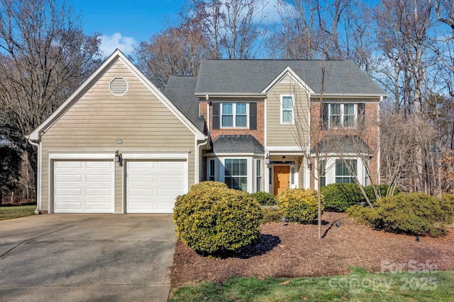 view of front of home with a garage